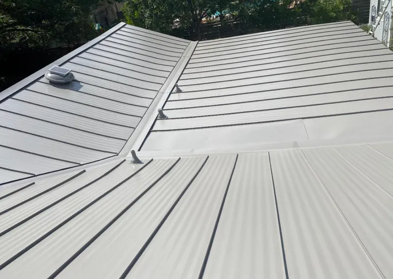 Solar attic fan installed on a metal roof for Roof Ventilation in Hilton Head Island